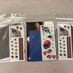 Creative Memories sticker packs. One is racing and two are American Flag.